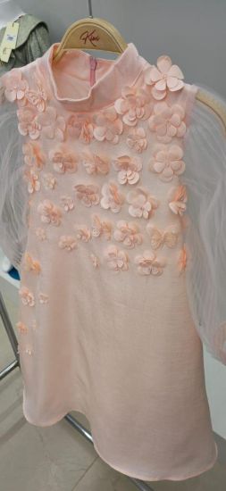 صورة فستان خربزي اكمام تل